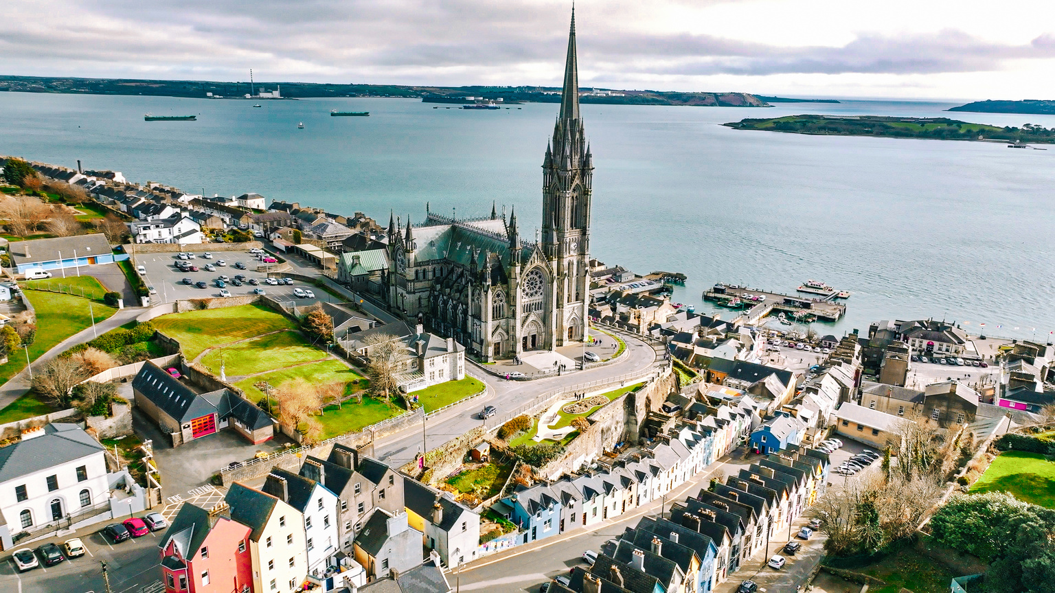 Aerial view of the Cathedral and colored houses in Cobh, Ireland ,colorful houses and St Colman's Cathedral in Cobh, Houses and catherdral in Cobh, colorful town