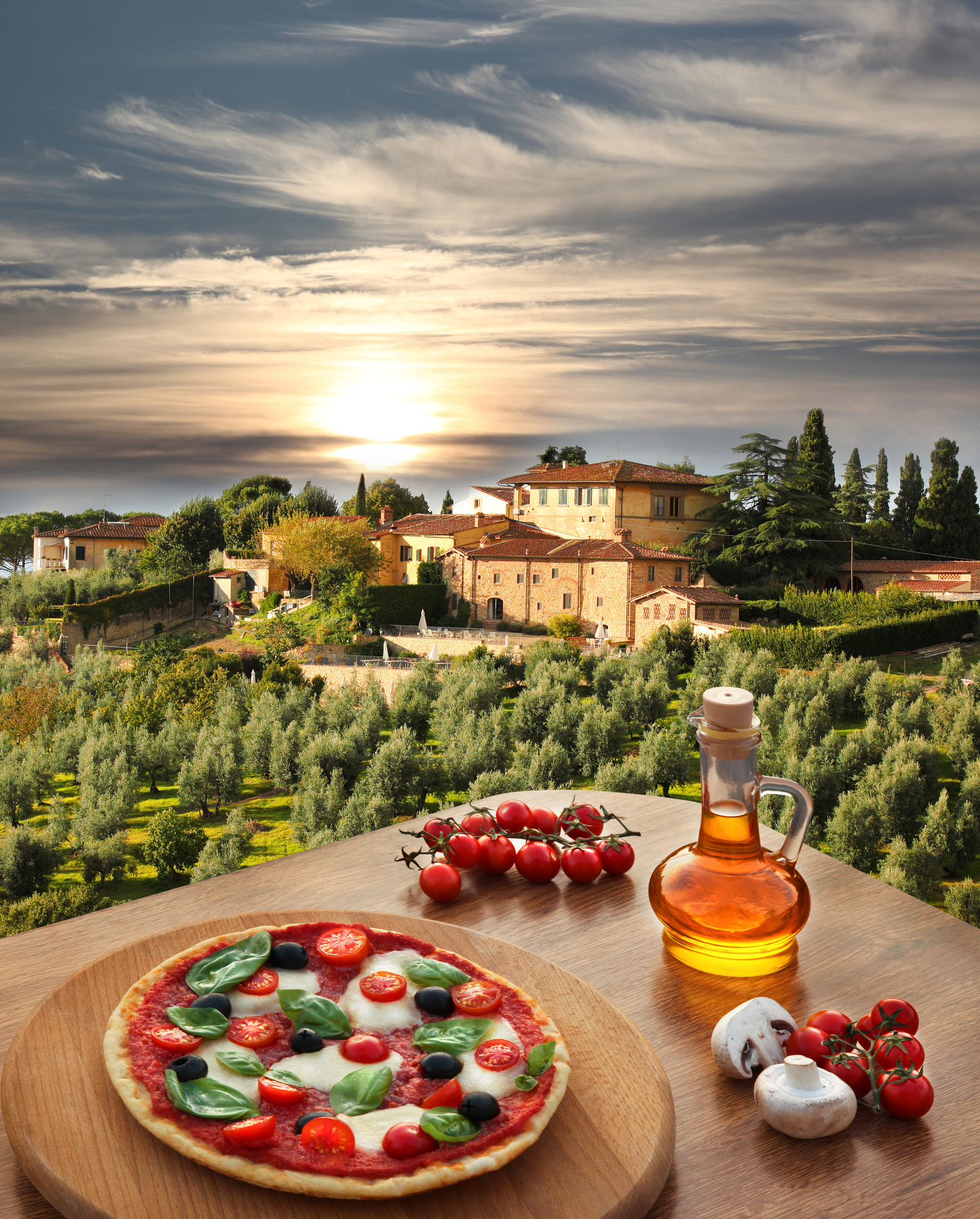 Italian pizza against villa  in Tuscany, Italy